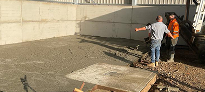 Concrete truck delivering ready mix in Essex